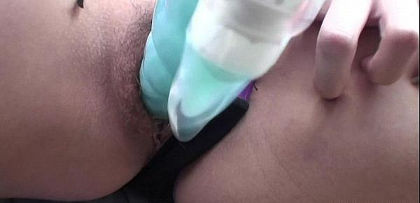  Asian lass is playing with her toy and her cunt